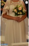 Piękna suknia ślubna z welonem - Obrazek 2