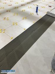 Układanie płytek na obiektach przemysłowych - Obrazek 3